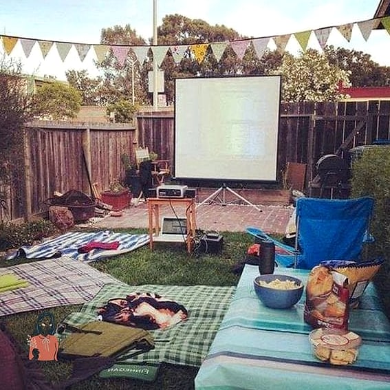 30 Incredible Summer Party Ideas Worth Stealing Right Now 3 Backyard Movie Night Under the Stars