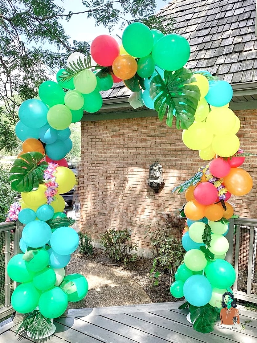 30 Incredible Tropical Party Ideas Everyone Will Be Talking About 2 Tropical Balloon Arch Entrance