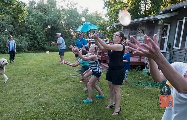 25 Family Reunion Games Everyone from Kids to Grandparents Will Love 10 Water Balloon Toss