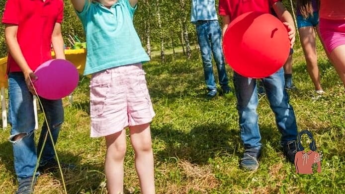 28 Creative Outdoor Games For Teens Worth Playing Again and Again 14 Balloon Stomp Battle