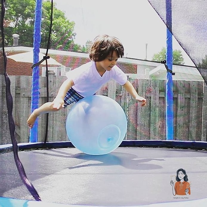 30 Amazing Trampoline Games That Are Absolutely Guaranteed to Be a Hit 8 The Bouncing Bubble Chase