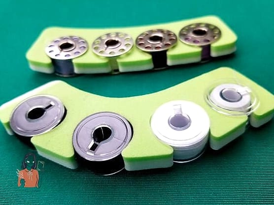 29 Life-changing Sewing Room Organization to Try This Weekend 13 Store Bobbins in a Labeled Case
