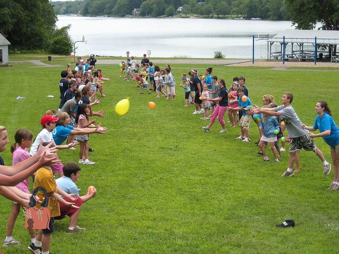 24 Simple Team Building Games For Kids That Are Going Viral on Pinterest 21 Water Balloon Toss Chain