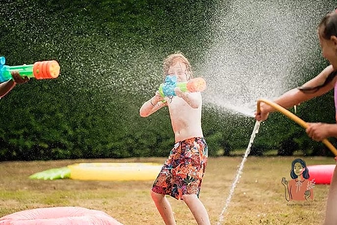 25 Summer Games That Will Make This the Best Summer Ever 15 Water Gun Tag