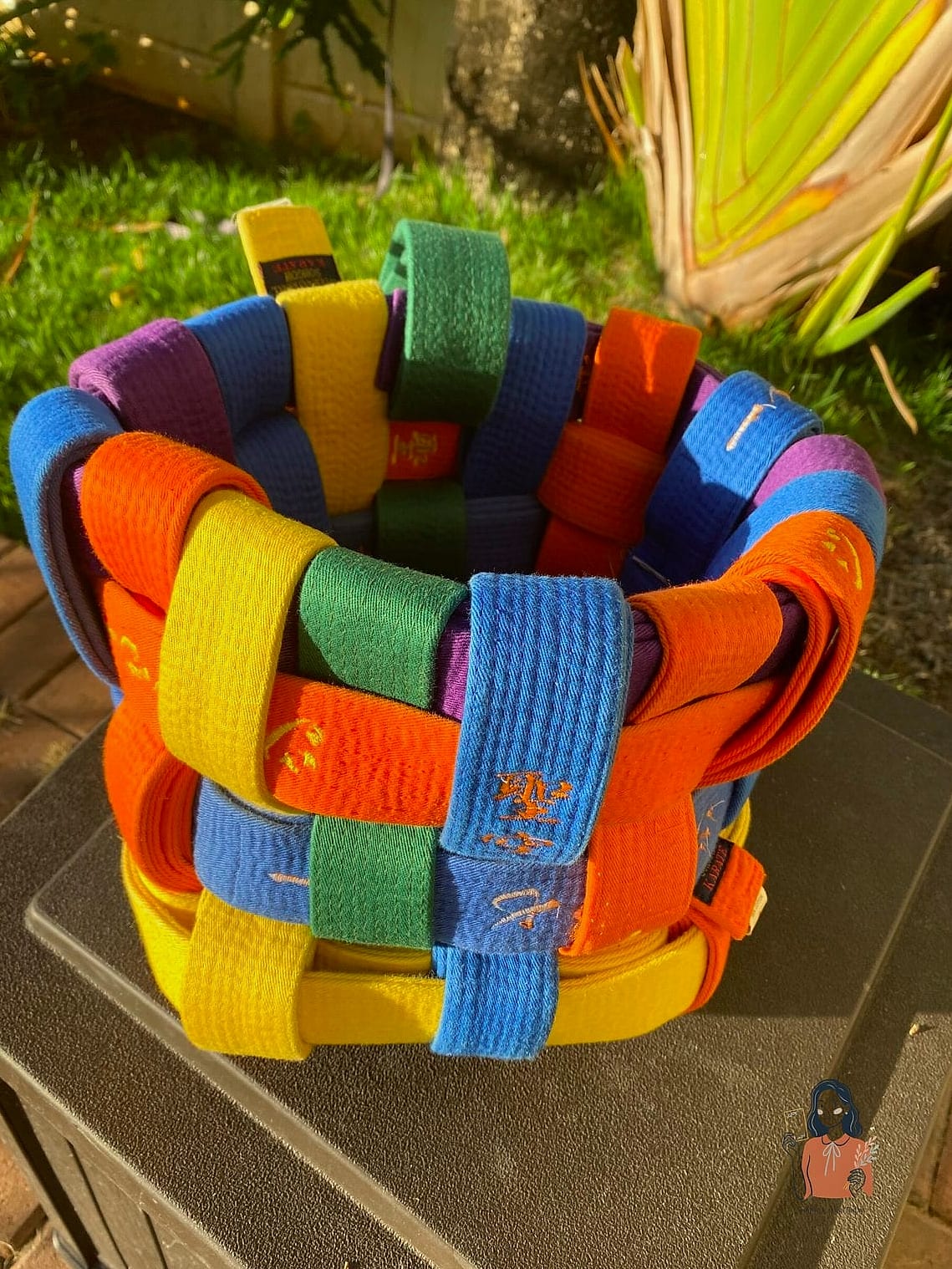 Woven Basket With Rolled Belts